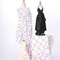 A group of dresses on display next to each other.