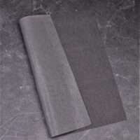 A piece of paper with a gray cover on it.